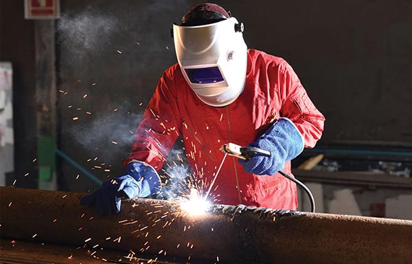 Protective clothing for use in welding and related processes